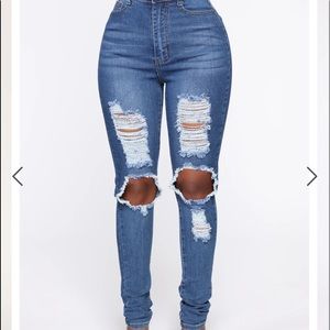 medium blue distressed women’s skinny jeans